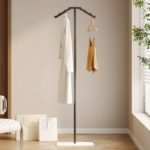 Space-Saving Metal Clothes Rack for Stylish Bedroom Use - Image 6